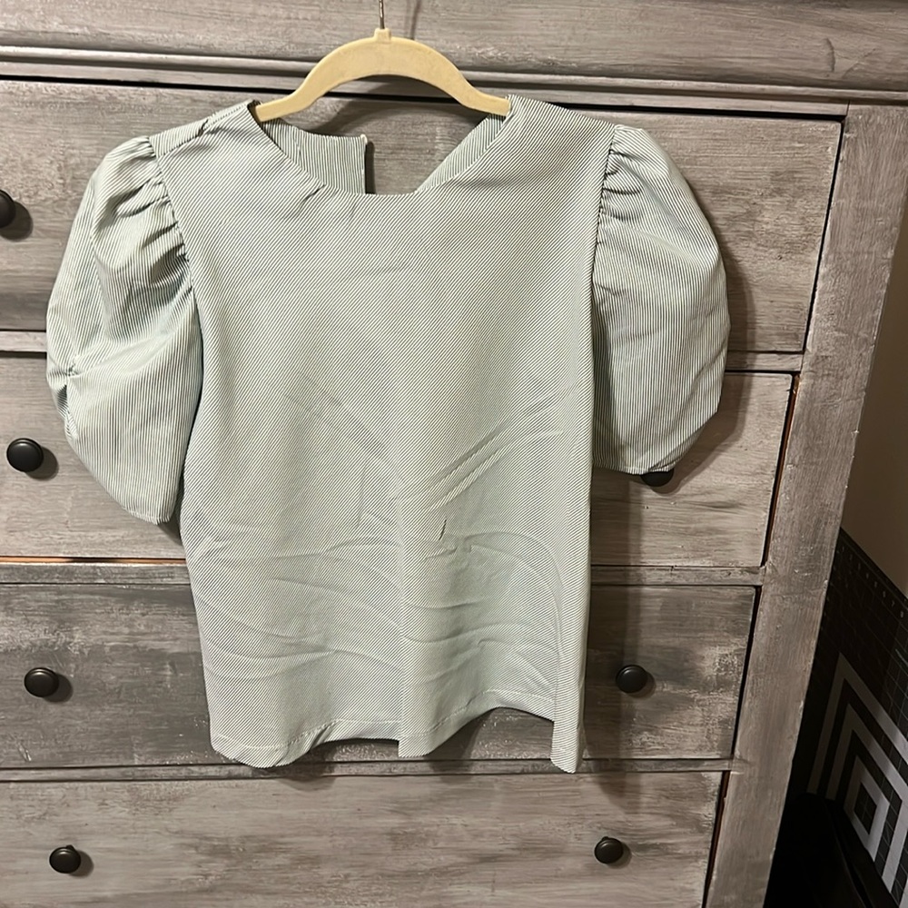 White and green striped blouse
